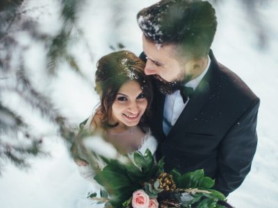 bearded-man-his-lovely-bride-pose-snow-magic-winter-forest_8353-5037