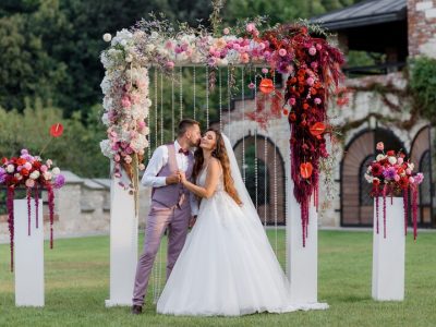 wedding-archway-backyard-happy-wedding-couple-outdoors-before-wedding-ceremony_8353-11057